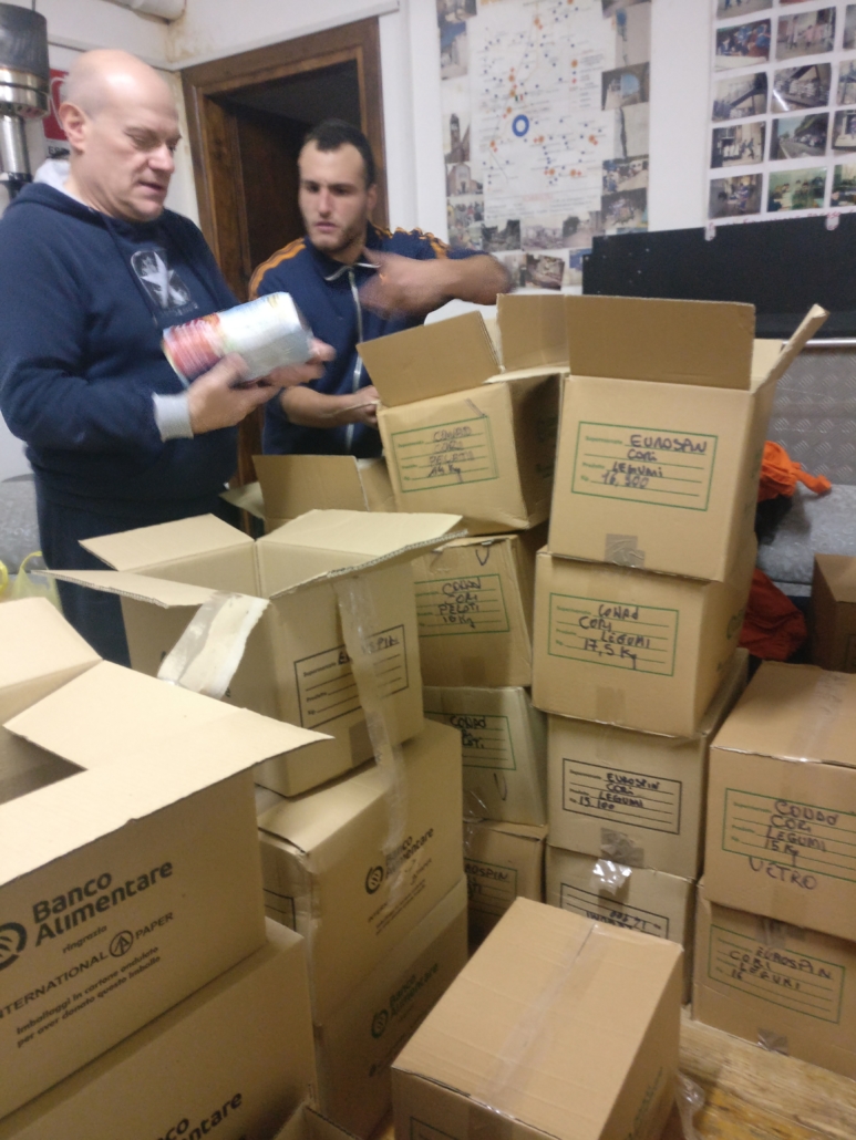 volunteers organising food bank service for marginalised groups
